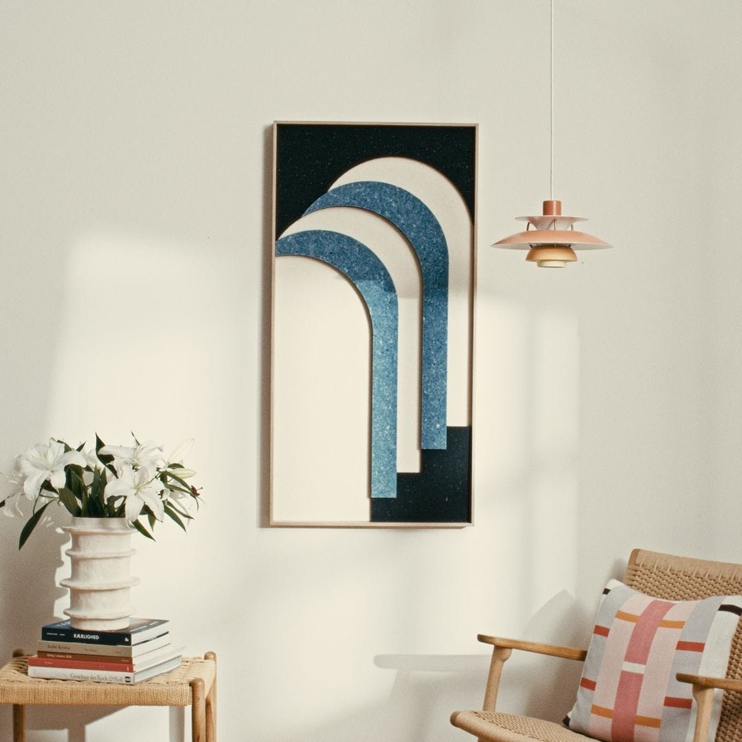 Unique modern art panel crafted from upcycled Danish Royal Guard uniforms in blue and white, featuring layered arch design.