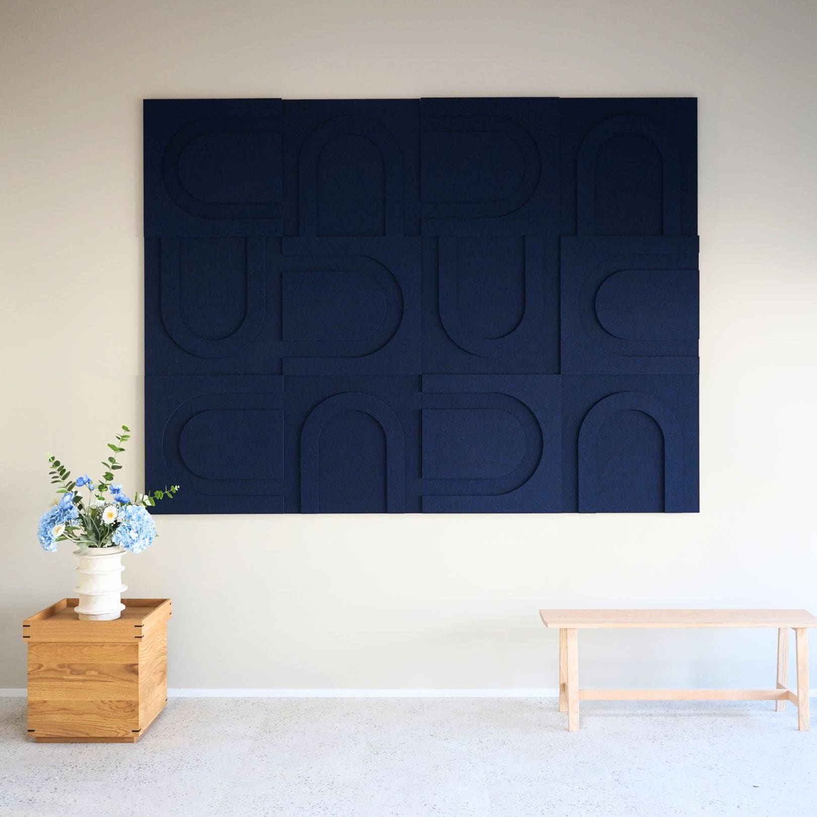 Geometric acoustic wall panels in dark blue from Arturel's collection, designed for sound absorption and modern interior design.